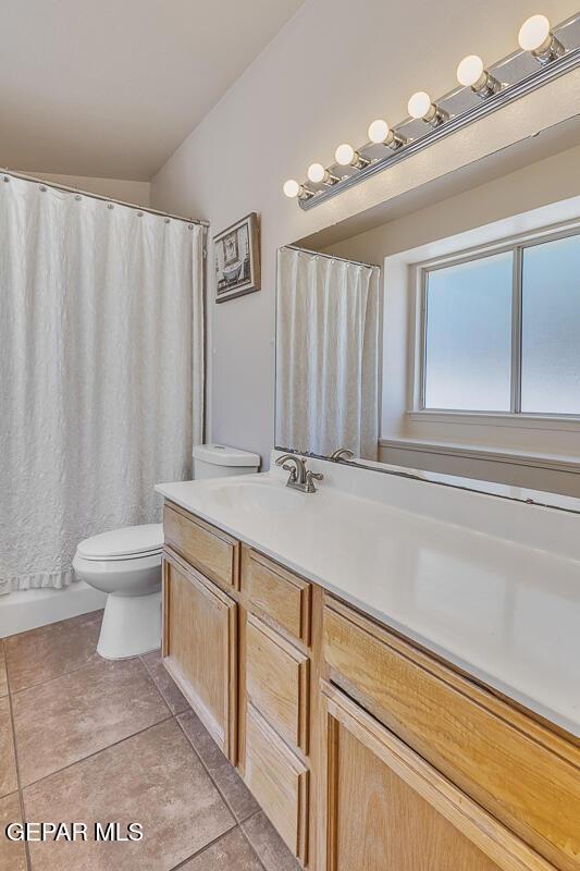 3280 Fawn Passage Place, El Paso, TX 79936 - bathroom featuring vanity, tile patterned flooring, and a shower with shower curtain