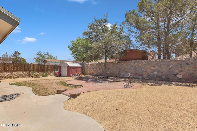 3280 Fawn Passage Place, El Paso, TX 79936 - fenced backyard featuring a storage unit and a patio