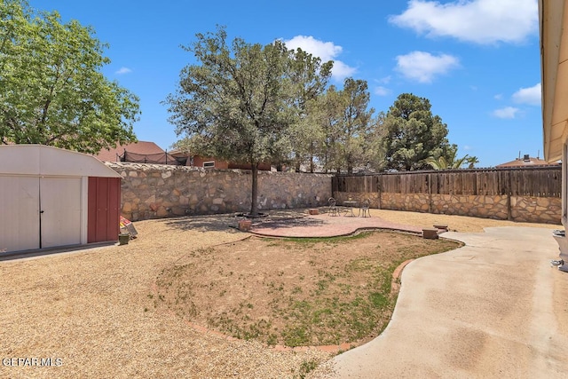 3280 Fawn Passage Place, El Paso, TX 79936 - fenced backyard featuring a storage shed and a patio area