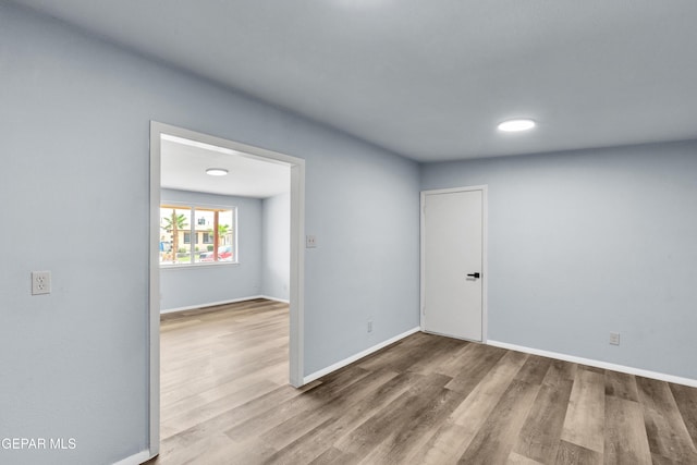231 Romeria Dr, El Paso, TX 79907 - empty room featuring wood finished floors and baseboards