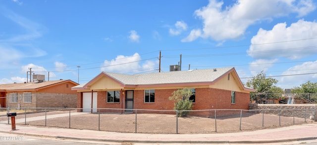 231 Romeria Dr, El Paso, TX 79907 - ranch-style home with brick siding, an attached garage, a fenced front yard, and concrete driveway