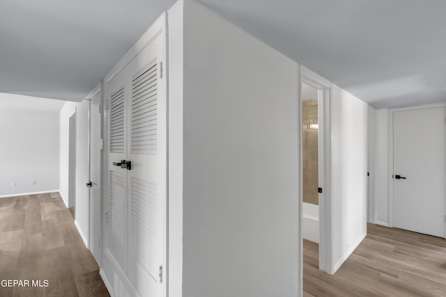 231 Romeria Dr, El Paso, TX 79907 - corridor featuring wood finished floors and baseboards