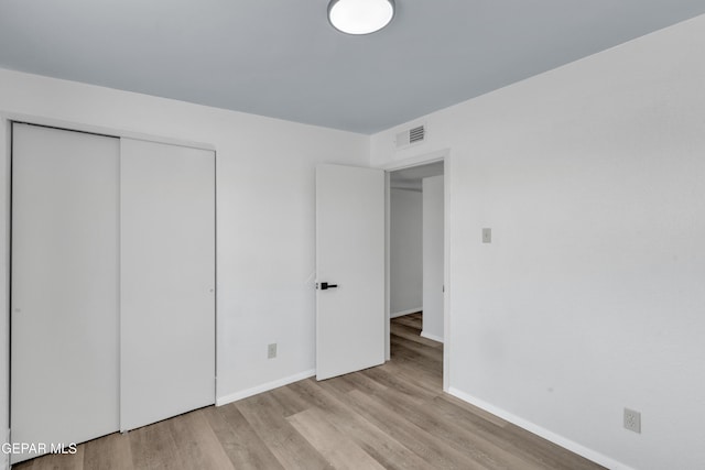 231 Romeria Dr, El Paso, TX 79907 - unfurnished bedroom with light wood-type flooring and a closet