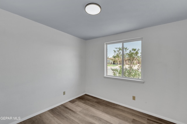 231 Romeria Dr, El Paso, TX 79907 - spare room featuring baseboards and wood finished floors