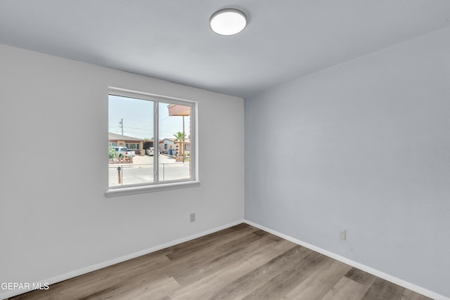 231 Romeria Dr, El Paso, TX 79907 - unfurnished room featuring wood finished floors and baseboards