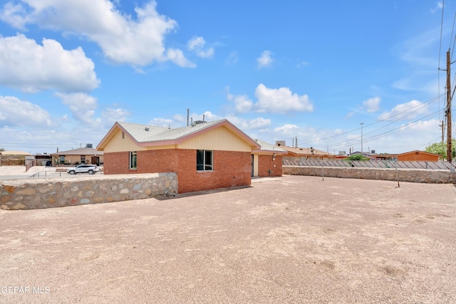 231 Romeria Dr, El Paso, TX 79907 - back of property featuring brick siding