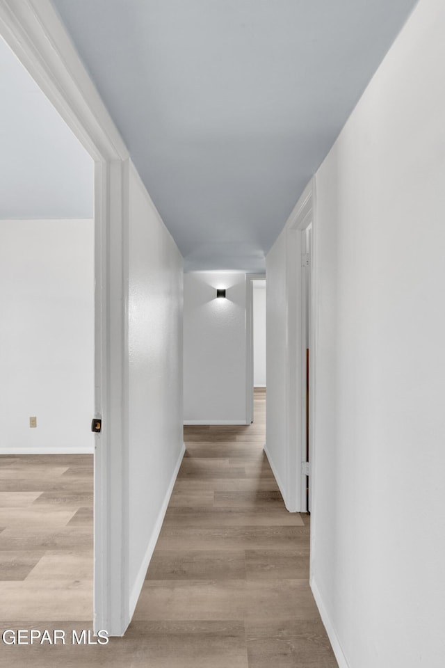 231 Romeria Dr, El Paso, TX 79907 - corridor with wood finished floors