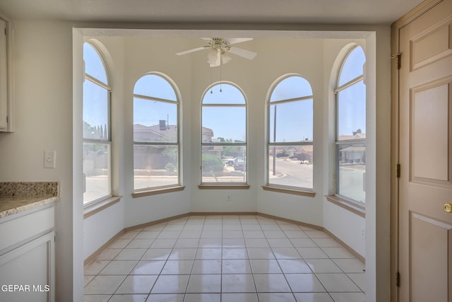 3148 Tierra Encino Dr, El Paso, TX 79938 - unfurnished dining area featuring a ceiling fan and light tile patterned flooring