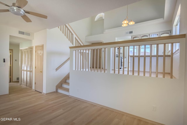 3148 Tierra Encino Dr, El Paso, TX 79938 - stairway with ceiling fan and wood finished floors