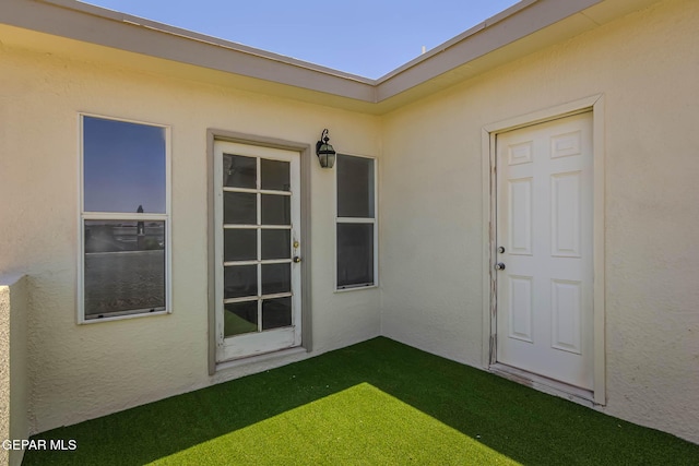 3148 Tierra Encino Dr, El Paso, TX 79938 - entrance to property featuring stucco siding and a lawn