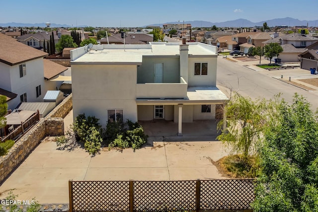 3148 Tierra Encino Dr, El Paso, TX 79938 - view of front of property with a residential view, stucco siding, and a mountain view