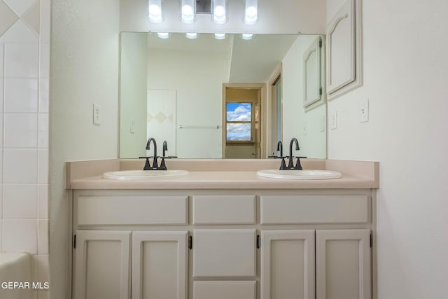3148 Tierra Encino Dr, El Paso, TX 79938 - bathroom with double vanity and a bathtub