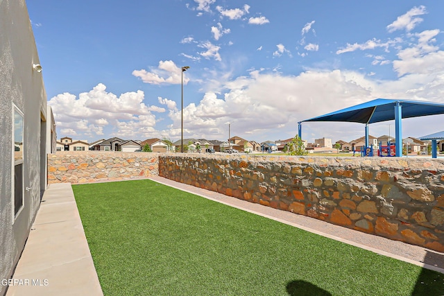 13860 Summer View Ave, El Paso, TX 79928 - fenced backyard featuring a residential view