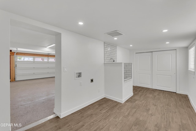 10229 Luella Ave, El Paso, TX 79925 - empty room featuring light wood-style flooring, plenty of natural light, and recessed lighting