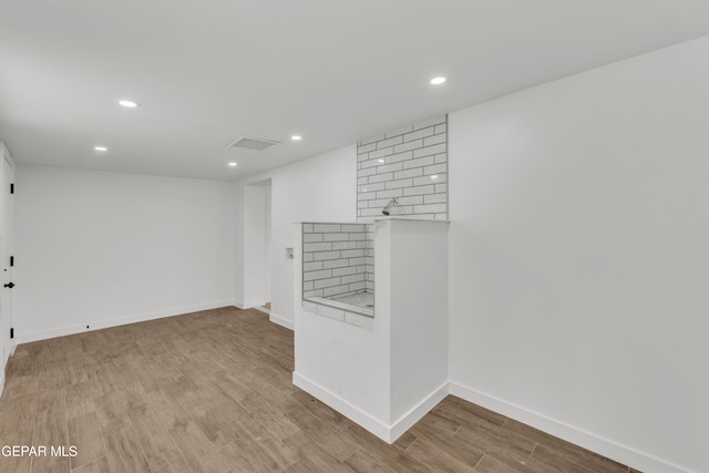 10229 Luella Ave, El Paso, TX 79925 - spare room featuring recessed lighting and wood finished floors