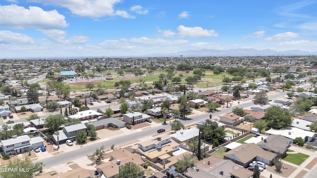 10229 Luella Ave, El Paso, TX 79925 - aerial perspective of suburban area with a mountainous background