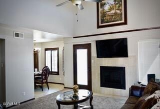 13643 Pecos River Rd, Clint, TX 79836 - living area with ceiling fan and a fireplace