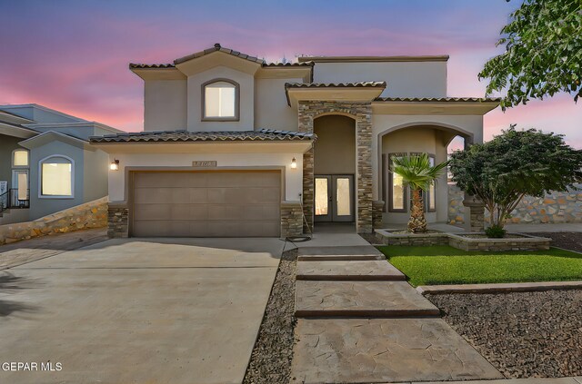 12511 Furlong Cir, El Paso, TX 79928 - mediterranean / spanish-style house featuring french doors, stucco siding, and stone siding
