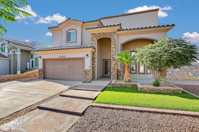 12511 Furlong Cir, El Paso, TX 79928 - mediterranean / spanish home with stucco siding, an attached garage, driveway, a tiled roof, and stone siding