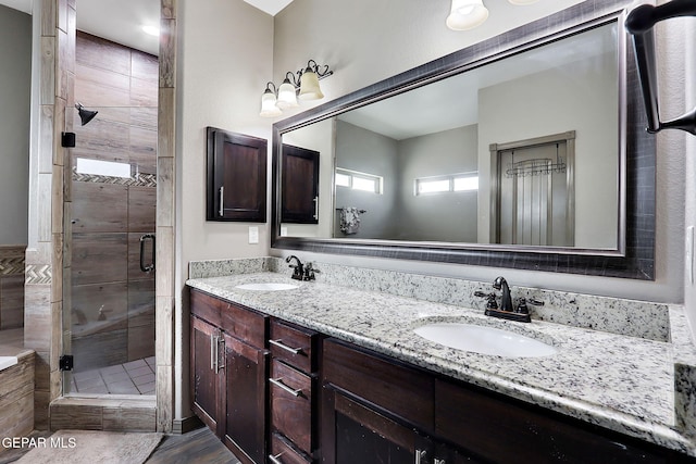 12511 Furlong Cir, El Paso, TX 79928 - bathroom with a shower stall and double vanity