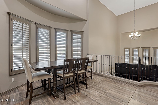 12511 Furlong Cir, El Paso, TX 79928 - dining space with a chandelier, a high ceiling, and healthy amount of natural light