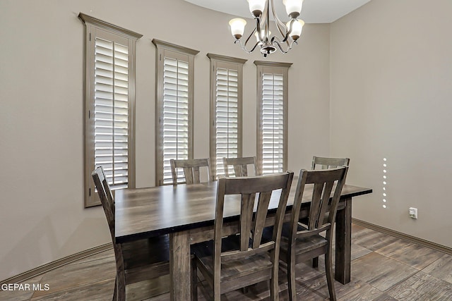 12511 Furlong Cir, El Paso, TX 79928 - dining area with a chandelier and wood finished floors