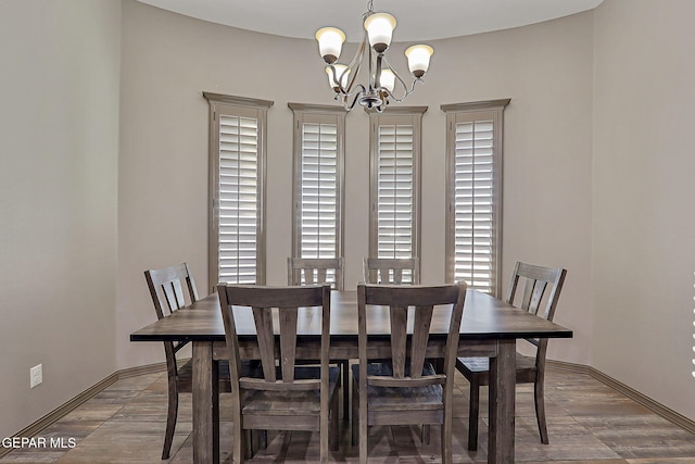 12511 Furlong Cir, El Paso, TX 79928 - dining space featuring a chandelier, wood finished floors, and healthy amount of natural light