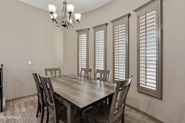 12511 Furlong Cir, El Paso, TX 79928 - dining room featuring a chandelier and wood finished floors