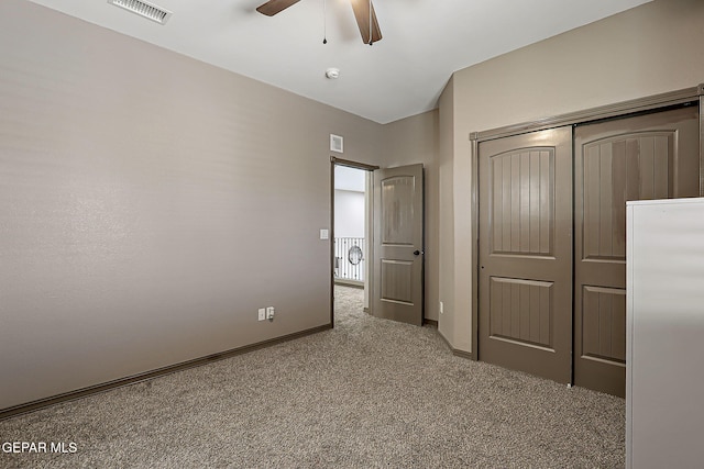 12511 Furlong Cir, El Paso, TX 79928 - unfurnished bedroom featuring carpet, a closet, ceiling fan, and refrigerator