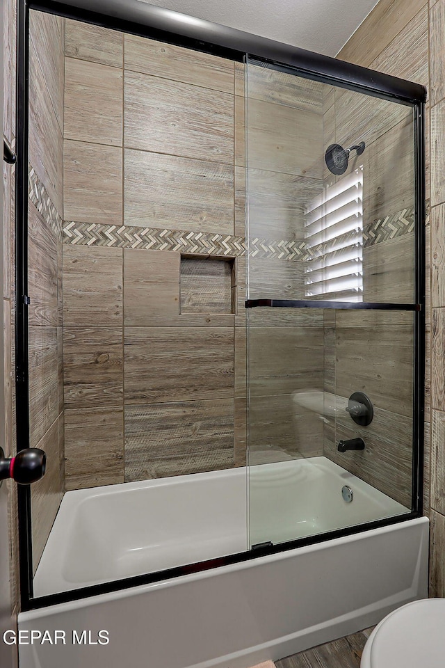 12511 Furlong Cir, El Paso, TX 79928 - full bathroom featuring shower / bath combination with glass door and toilet