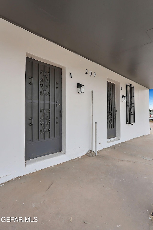 209 Hardesty Pl, El Paso, TX 79905 - view of exterior entry featuring stucco siding