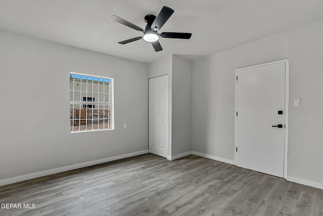 209 Hardesty Pl, El Paso, TX 79905 - unfurnished bedroom with wood finished floors, a closet, and a ceiling fan