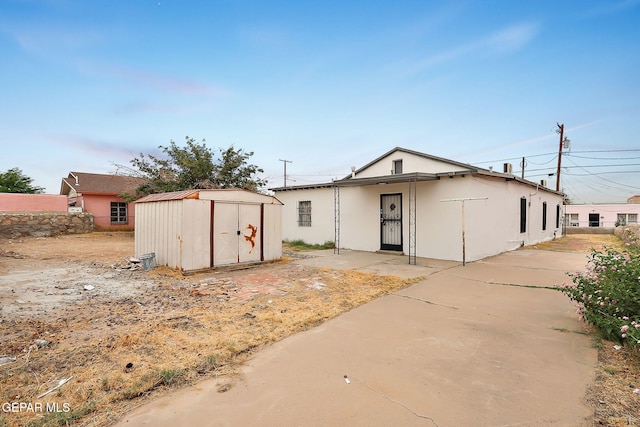 209 Hardesty Pl, El Paso, TX 79905 - view of front of home with a shed and stucco siding
