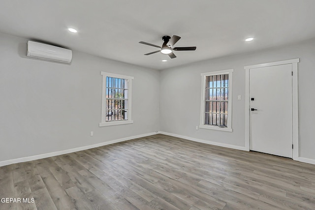 209 Hardesty Pl, El Paso, TX 79905 - entrance foyer with a wall unit AC, a ceiling fan, wood finished floors, and recessed lighting
