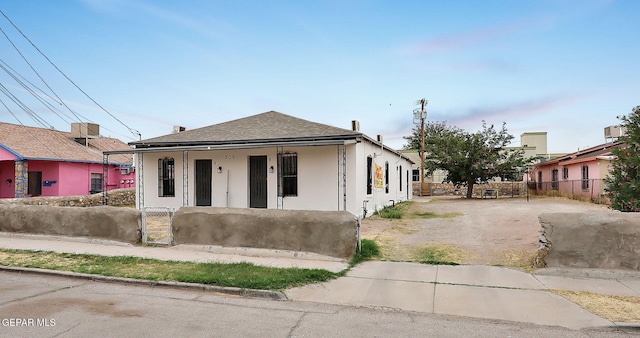 209 Hardesty Pl, El Paso, TX 79905 - bungalow-style house with covered porch, stucco siding, and a shingled roof