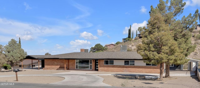 3116 Titanic Ave, El Paso, TX 79904 - ranch-style house featuring brick siding and a chimney