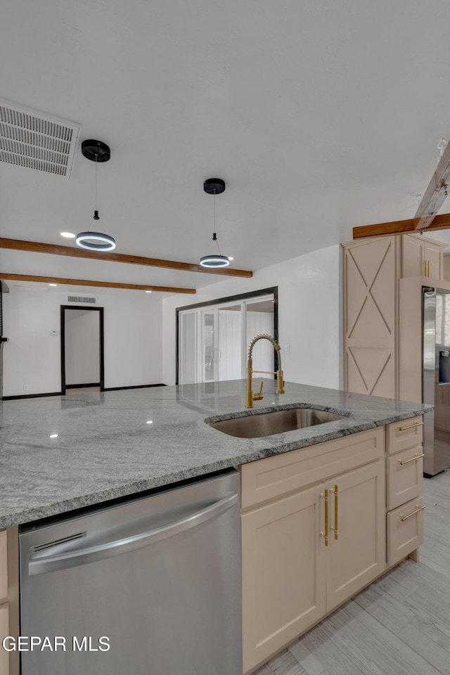 3116 Titanic Ave, El Paso, TX 79904 - kitchen featuring stainless steel appliances, decorative light fixtures, light stone countertops, and white cabinetry
