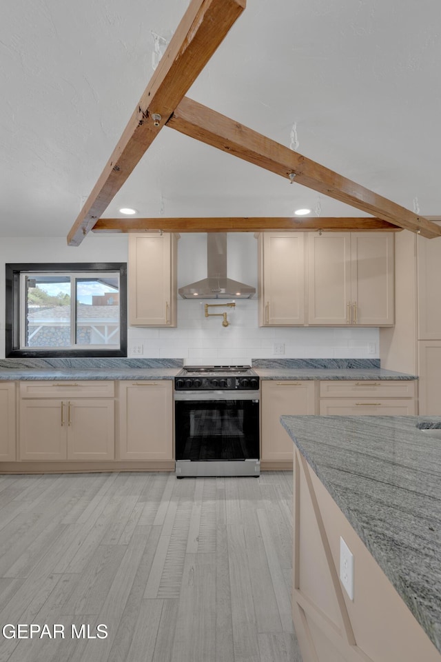3116 Titanic Ave, El Paso, TX 79904 - kitchen with electric stove, wall chimney range hood, beamed ceiling, light wood finished floors, and light stone counters