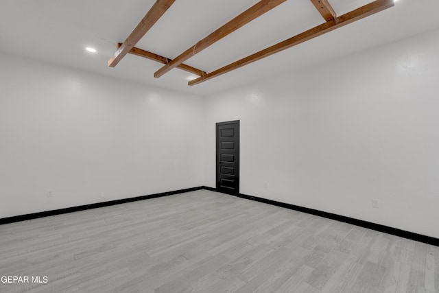 3116 Titanic Ave, El Paso, TX 79904 - unfurnished room with light wood-style flooring, beam ceiling, and recessed lighting