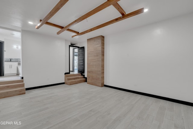 3116 Titanic Ave, El Paso, TX 79904 - spare room with stairs, light wood-type flooring, beamed ceiling, and recessed lighting