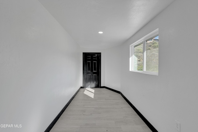 3116 Titanic Ave, El Paso, TX 79904 - empty room with light wood-style floors and recessed lighting