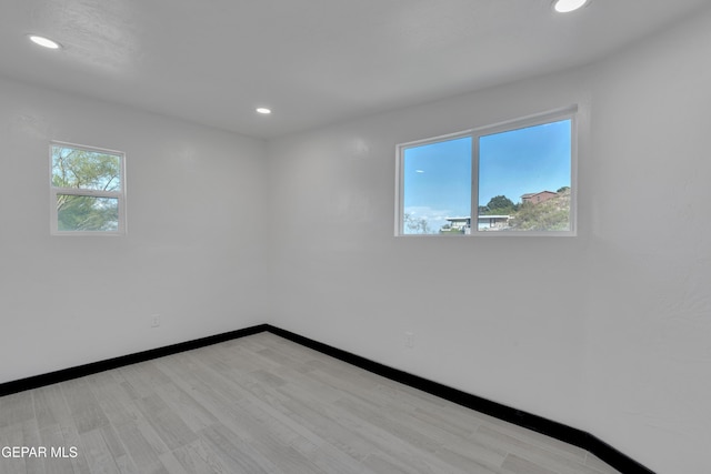 3116 Titanic Ave, El Paso, TX 79904 - spare room featuring recessed lighting and wood finished floors