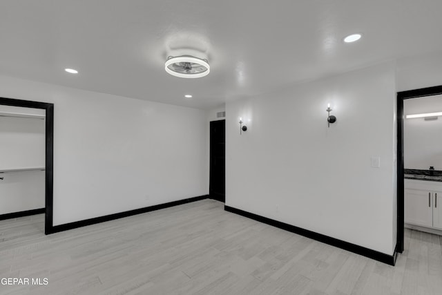 3116 Titanic Ave, El Paso, TX 79904 - empty room featuring recessed lighting and light wood-style flooring
