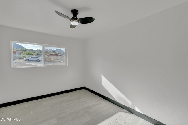 3116 Titanic Ave, El Paso, TX 79904 - spare room featuring ceiling fan and light wood-style floors
