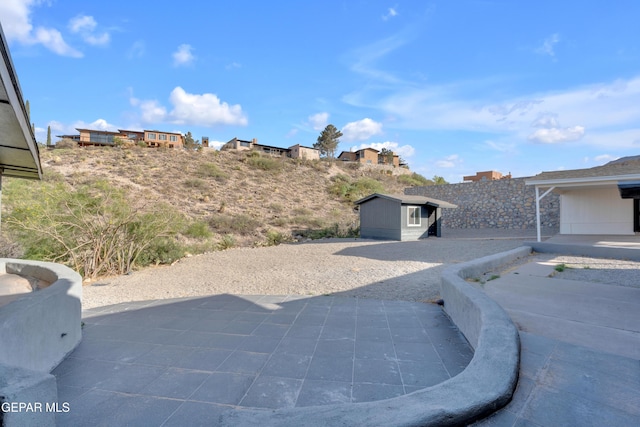 3116 Titanic Ave, El Paso, TX 79904 - view of patio featuring a shed