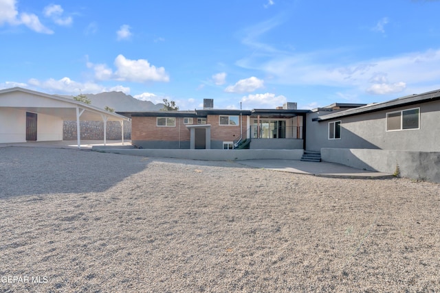 3116 Titanic Ave, El Paso, TX 79904 - rear view of house featuring brick siding