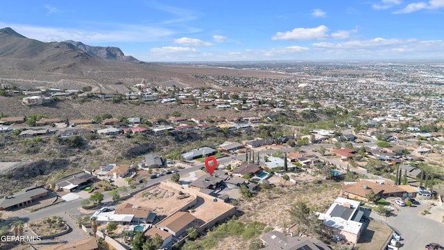 3116 Titanic Ave, El Paso, TX 79904 - aerial view of property's location featuring a mountainous background and nearby suburban area