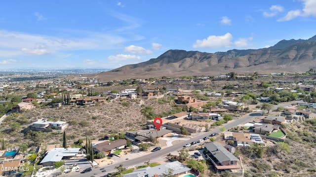 3116 Titanic Ave, El Paso, TX 79904 - aerial overview of property's location with a mountainous background and nearby suburban area