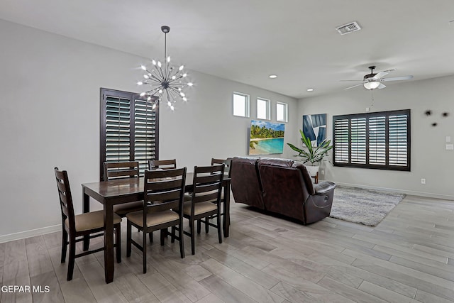 13120 Wesleyan, El Paso, TX 79928 - dining room with light wood finished floors, a chandelier, a ceiling fan, and recessed lighting