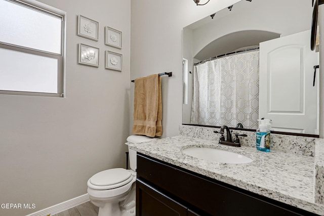 13120 Wesleyan, El Paso, TX 79928 - full bathroom featuring vanity and wood finished floors